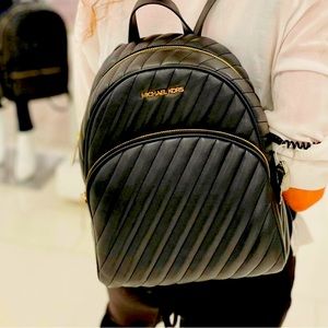 COPY - I Michael Kors Erin Vegan
Faux Leather Md Backpack with gold accessories